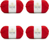 Four red BATELO thin chenille yarn skeins with Feel Soft labels on a white background