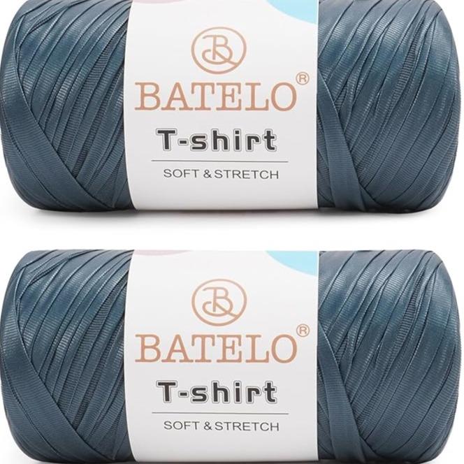 Two blue gray BATELO leather-look T-shirt yarn skeins with branded labels on a white background