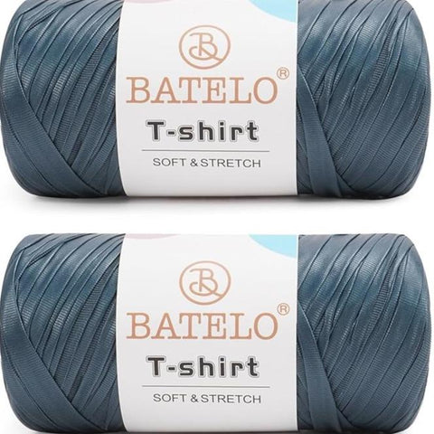 Two blue gray BATELO leather-look T-shirt yarn skeins with branded labels on a white background