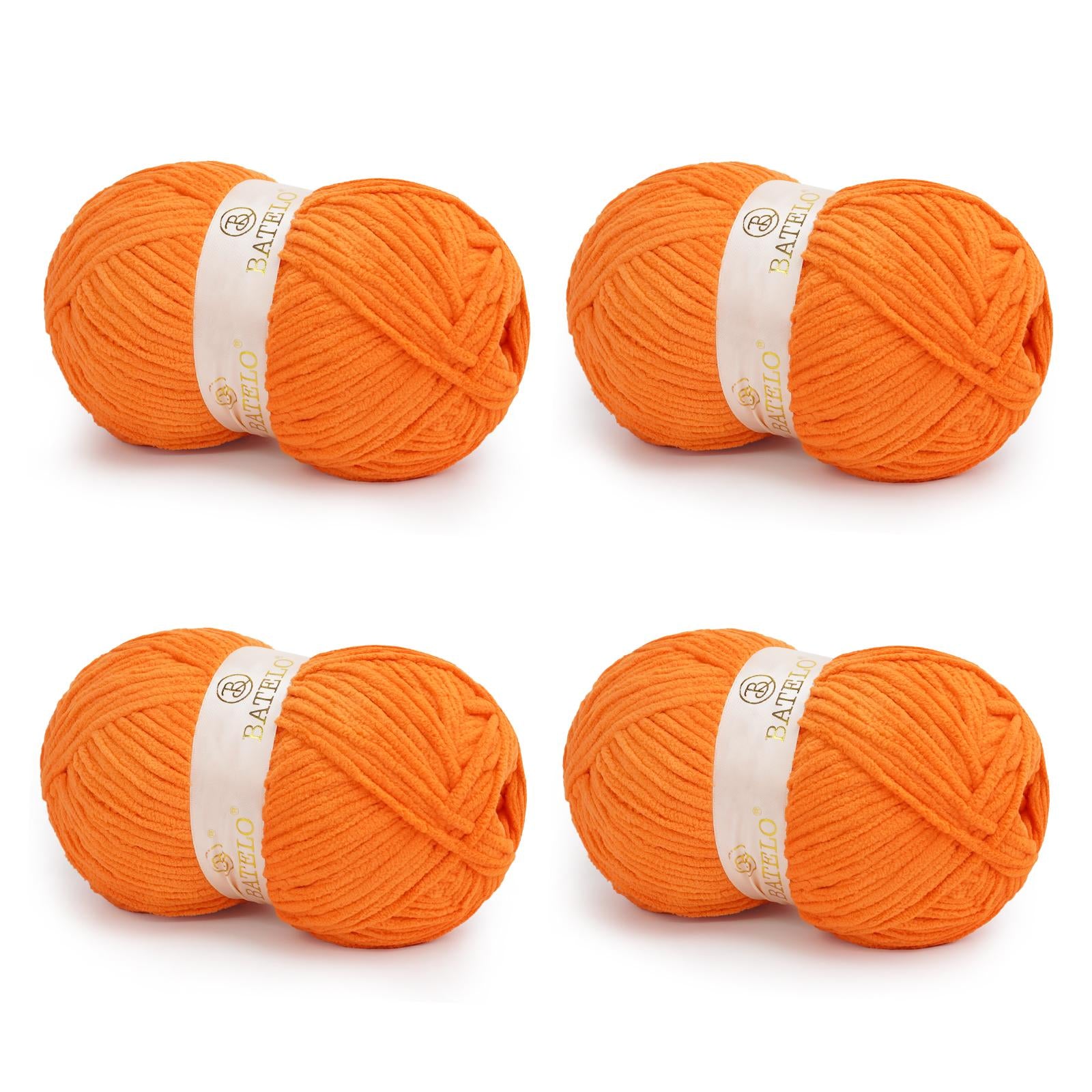 Four orange BATELO bulky chenille blanket yarn skeins arranged on a white background