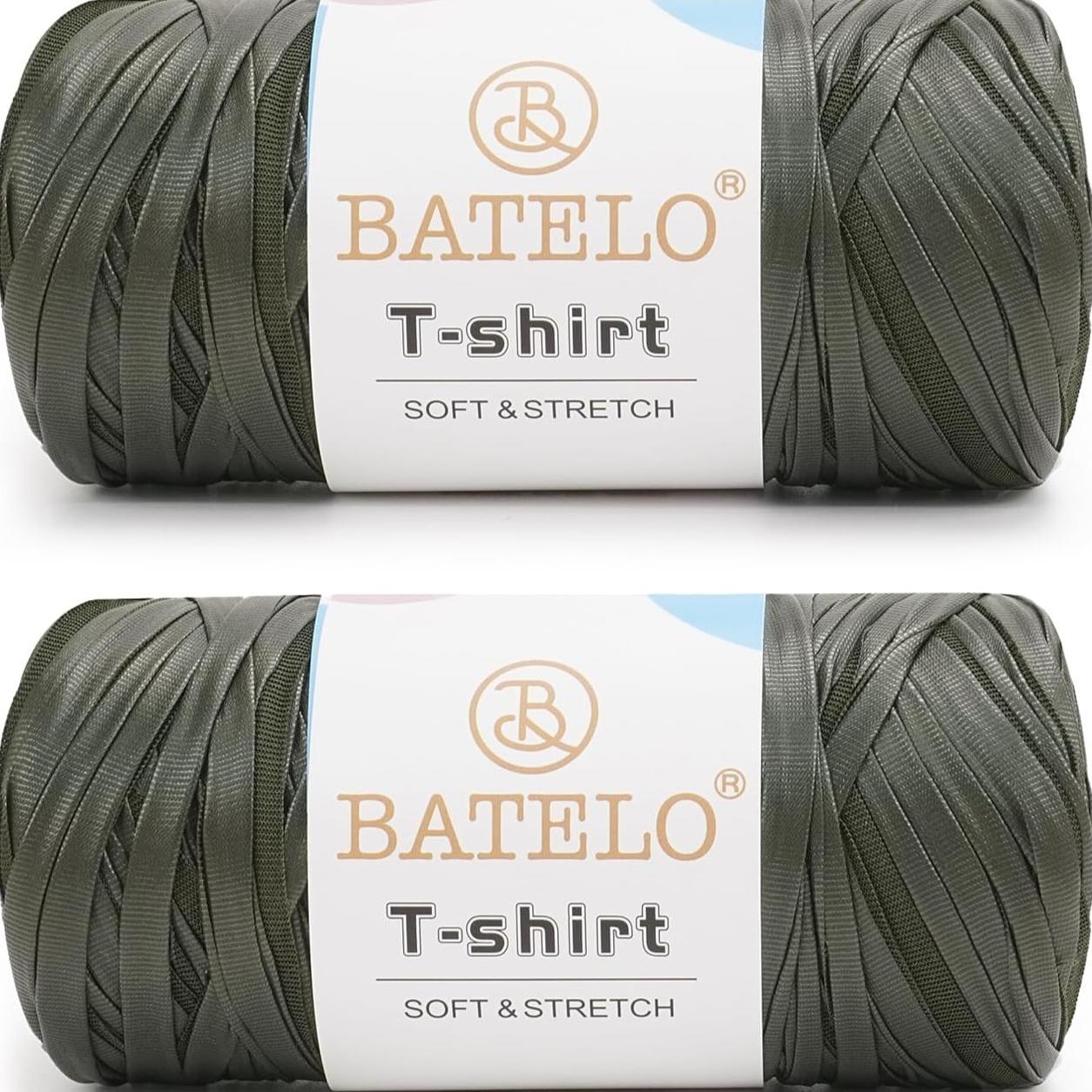 Two dark green BATELO leather-look T-shirt yarn skeins with branded labels on a white background