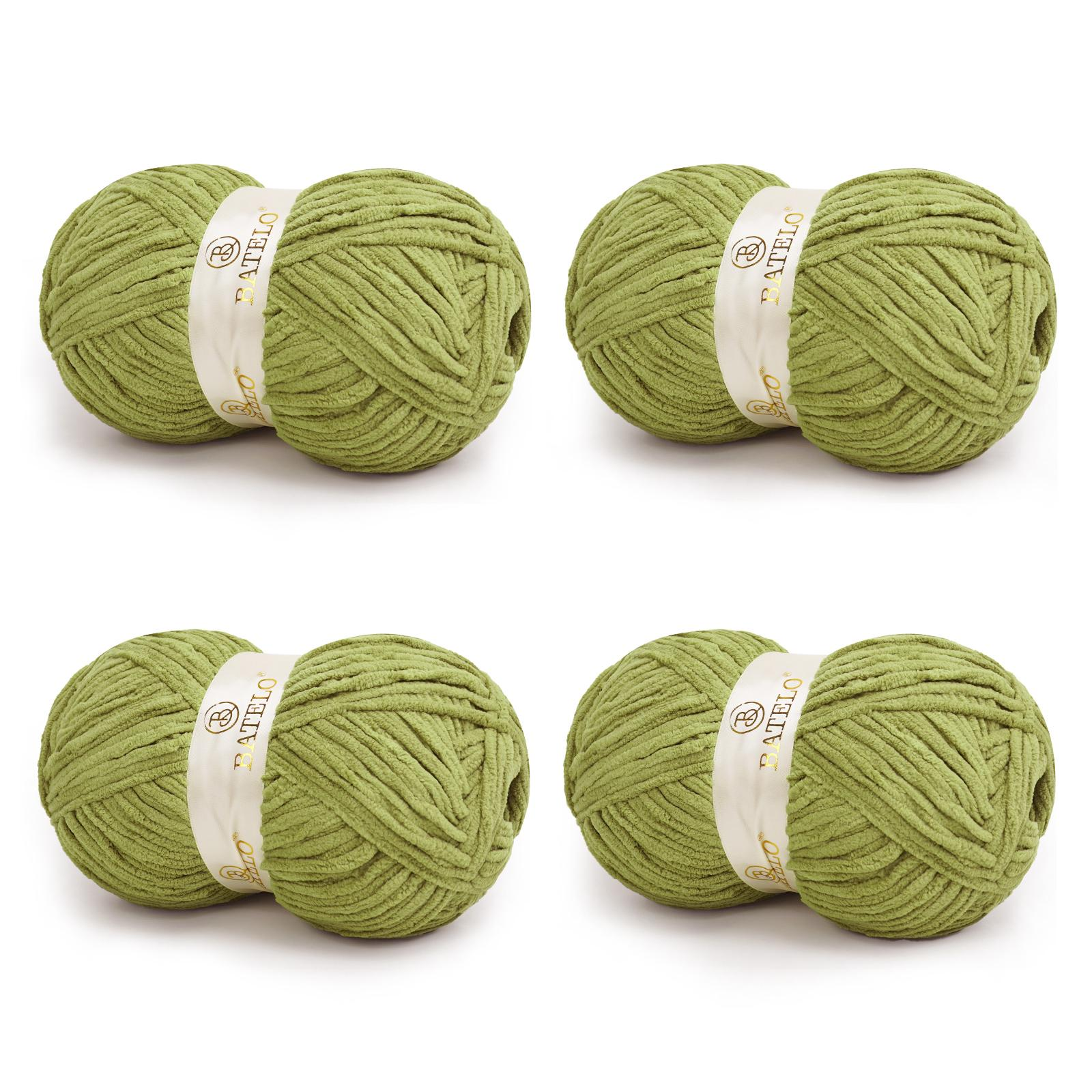 Four olive green BATELO bulky chenille blanket yarn skeins arranged on a white background
