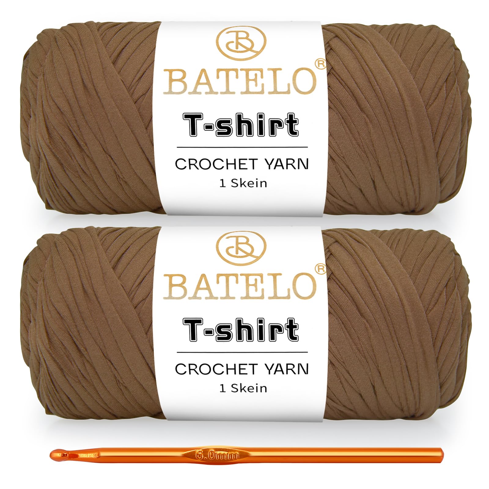 Two tan BATELO T-shirt yarn skeins with a gold crochet hook on a white background