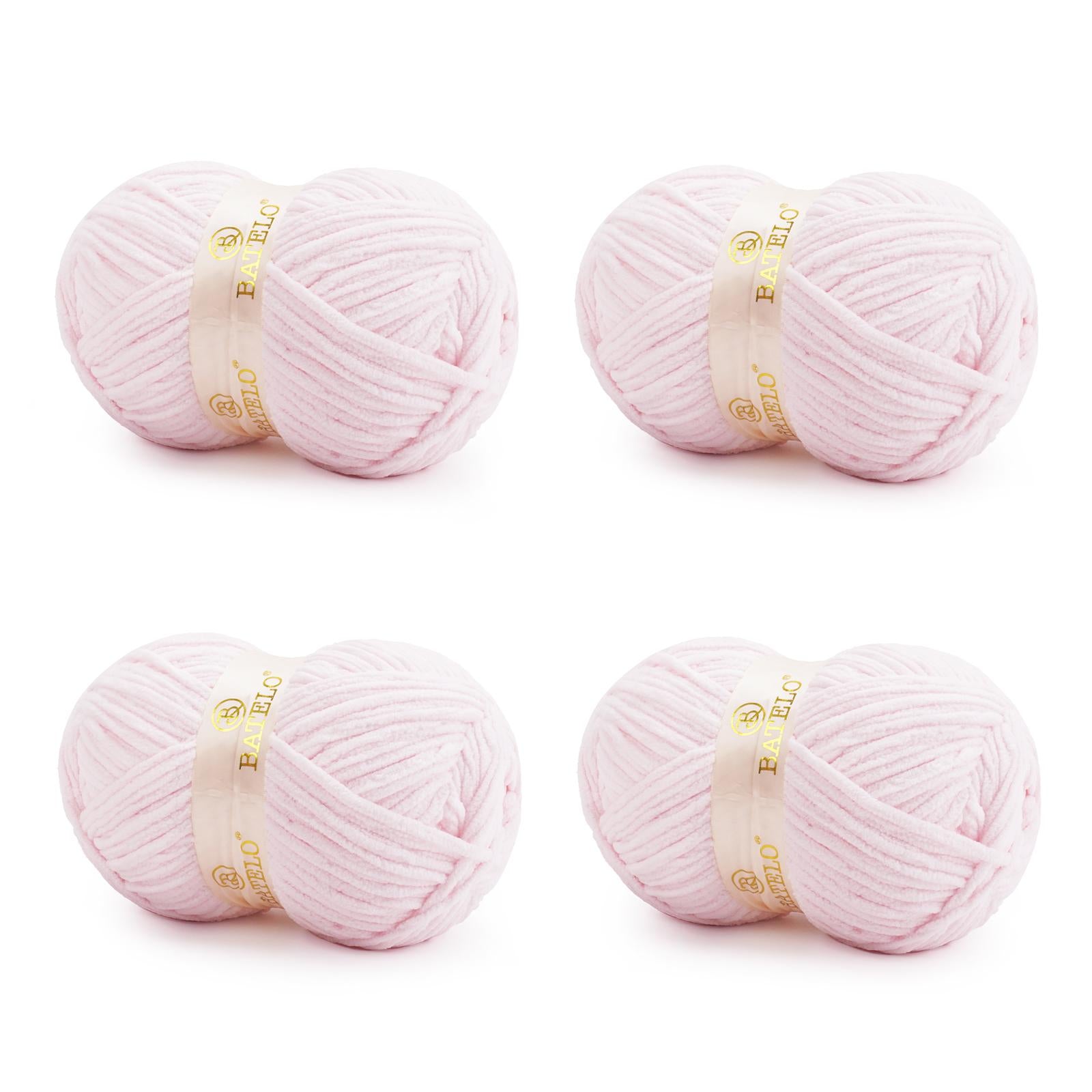 Four pale pink BATELO bulky chenille blanket yarn skeins arranged on a white background