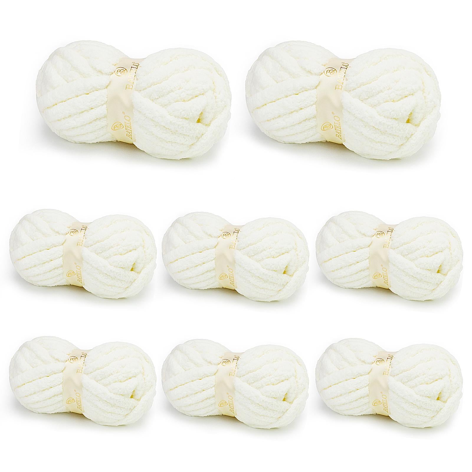 Eight white BATELO chunky chenille yarn skeins arranged on a white background