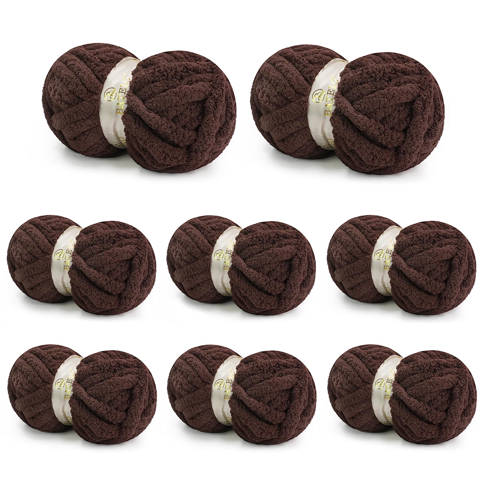 Eight dark brown BATELO chunky chenille yarn skeins arranged on a white background