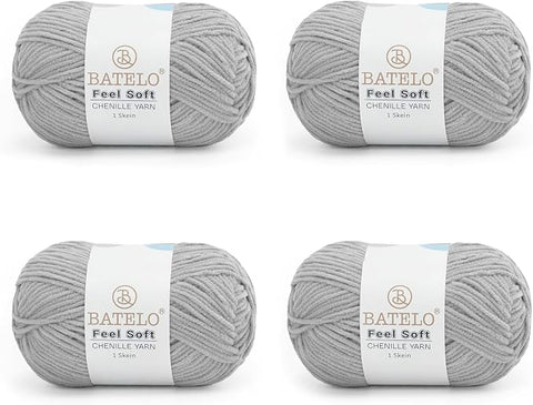 Four gray BATELO thin chenille yarn skeins with Feel Soft labels on a white background