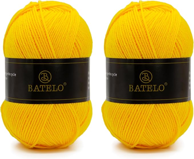 Two yellow BATELO light acrylic yarn skeins with branded bands on a white background