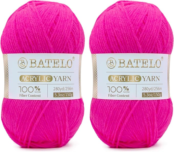 Two hot pink BATELO light acrylic yarn skeins with branded bands on a white background