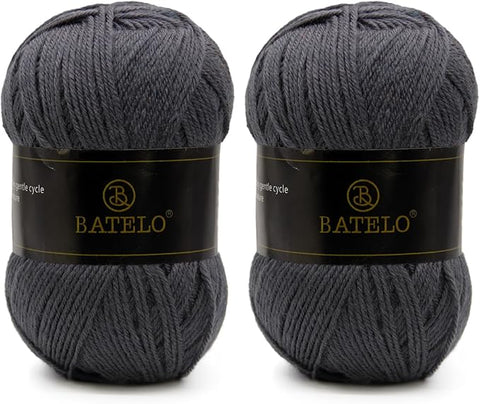 Two dark gray BATELO light acrylic yarn skeins with branded bands on a white background