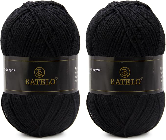 Two black BATELO light acrylic yarn skeins with branded bands on a white background