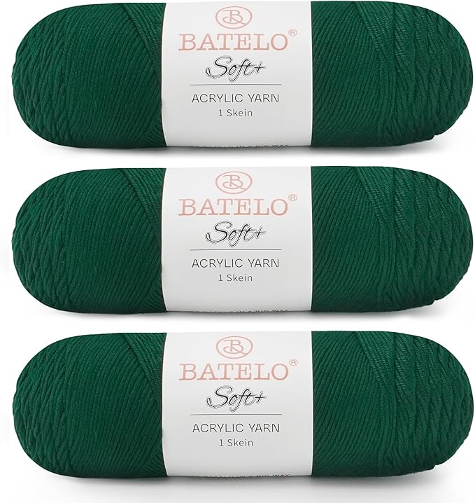 Three dark green BATELO medium acrylic yarn skeins with white labels on a white background