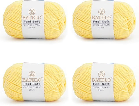 Four pale yellow BATELO thin chenille yarn skeins with Feel Soft labels on a white background