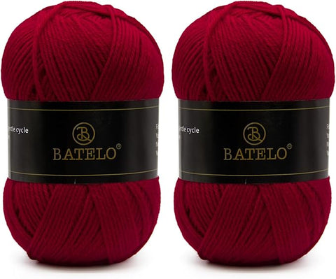 Two burgundy BATELO light acrylic yarn skeins with branded bands on a white background