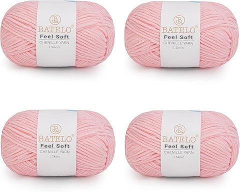 Four light pink BATELO thin chenille yarn skeins with Feel Soft labels on a white background
