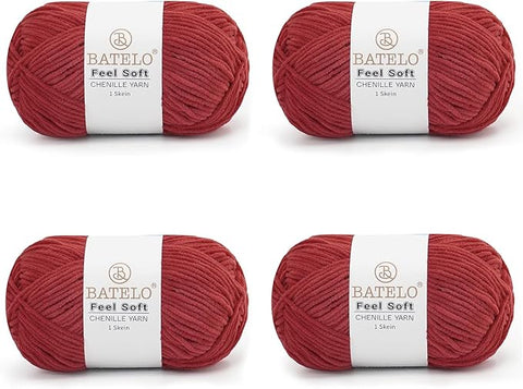 Four brick red BATELO thin chenille yarn skeins with Feel Soft labels on a white background