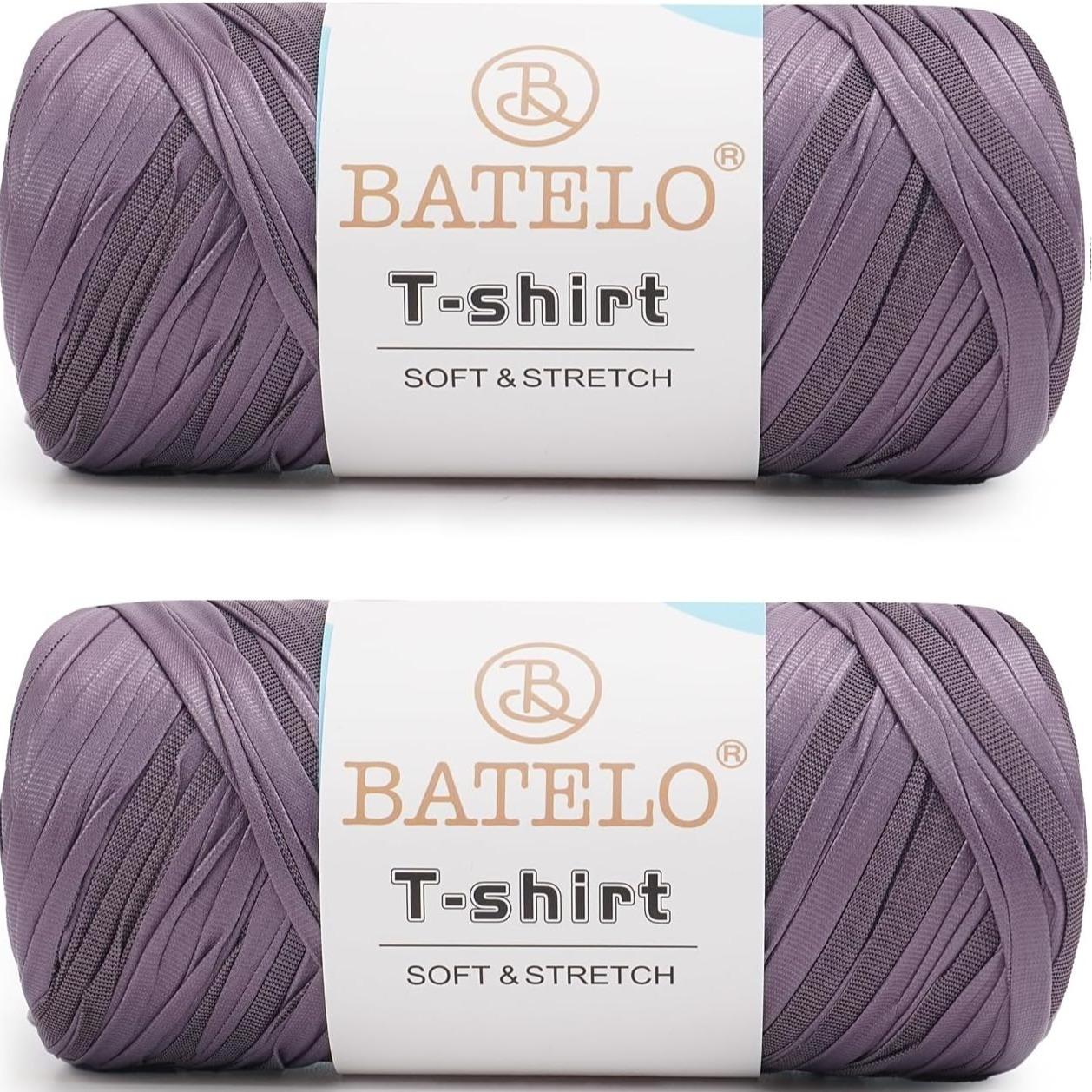 Two muted purple BATELO leather-look T-shirt yarn skeins with branded labels on a white background