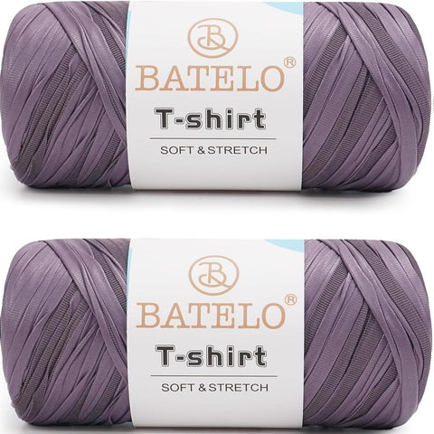 Two muted purple BATELO leather-look T-shirt yarn skeins with branded labels on a white background