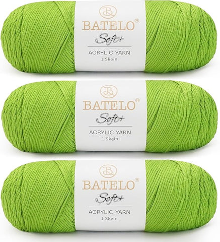 Three lime green BATELO medium acrylic yarn skeins with white labels on a white background
