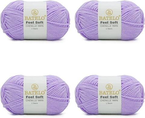 Four lilac BATELO thin chenille yarn skeins with Feel Soft labels on a white background