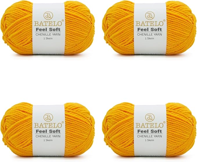 Four golden yellow BATELO thin chenille yarn skeins with Feel Soft labels on a white background