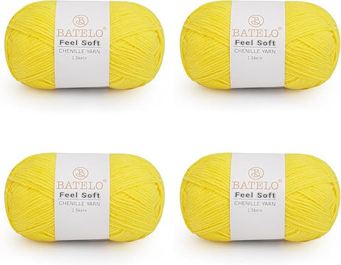 Four yellow BATELO thin chenille yarn skeins with Feel Soft labels on a white background